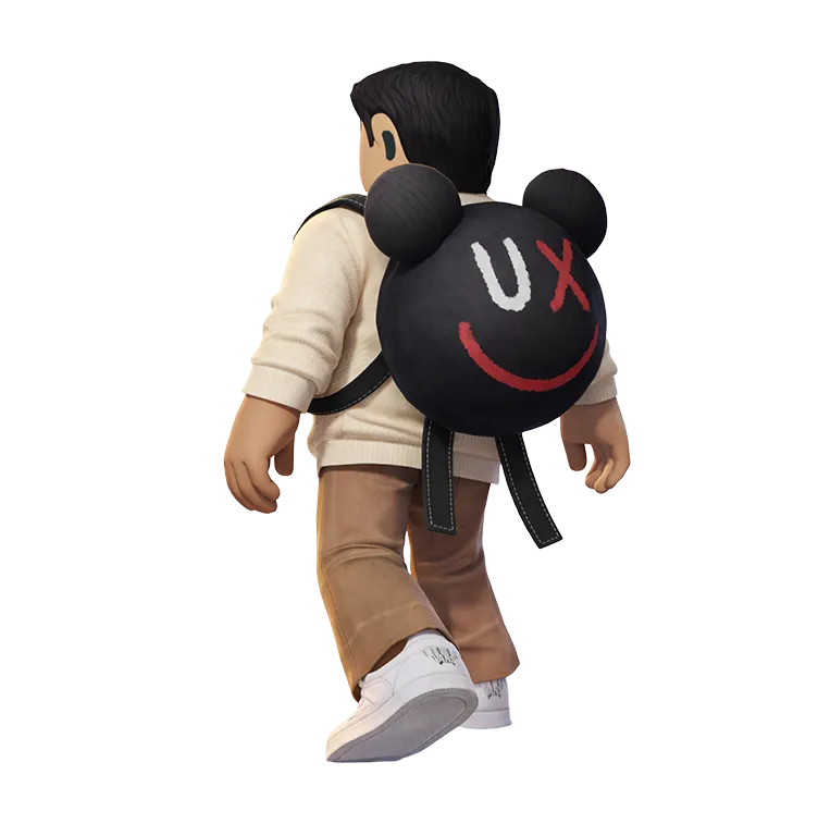 A man wearing a black backpack that looks like a stylized mouse head